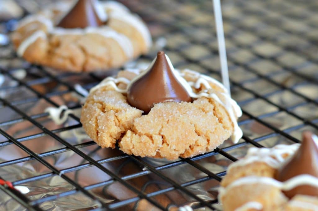 White chocolate striped peanut butter blossoms